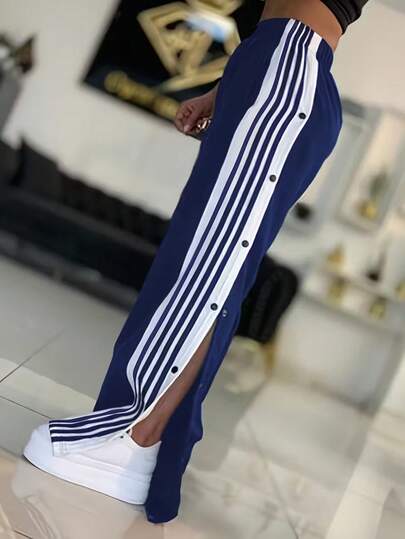 Quần ống rộng kẻ sọc trắng và xanh navy, có sọc trắng và cúc, kiểu dáng thoải mái, phù hợp cho thể thao và mặc hàng ngày (có thể giặt máy), ống quần không chun, thích hợp cho mùa xuân.