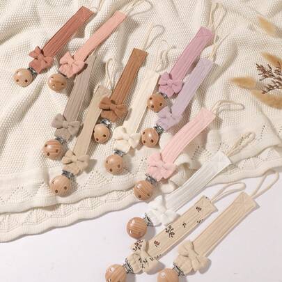 2 stuks speenclips, modieuze speenkettingen met strikjes in roze, paars, bruin en abrikoos, geschikt voor dagelijks gebruik, op reis en thuis voor jongens en meisjes.