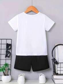 Disney Short-Sleeve T-Shirt And Shorts Summer Set Featuring Mickey Mouse Lettering On The T-Shirt And Mickey Head Print On The Shorts, Crafted From Soft, Comfortable Fabric. This Two-Piece Boys' Set Is Perfect For Spring And Summer, Offering A Cool Look Ideal For School, Shopping, Or Travel. It Also Makes A Great Gift For Young Boys. - Trắng + Đen - Xem 3