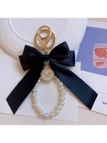 1pc Gorgeous Matte Bow With Faux Pearl Keychain Lovely Faux Pearl Beaded Bracelet Vintage Charm Women And Girls Wallets Socks Backpacks Car Accessories Ribbons Pearl Pendant Valentine's Day Bow Keychain School Supplies Teacher Gifts Back To School Teacher Essentials Valentine's Day Bag Charm Pearl Cute Goth Y2k Faux Pearl Beaded Bracelet Matte Bow Keychain For Women Girls Car Backpack Decor Valentine Teacher Gift Back To School Supplies Goth Y2k Cute Fashion Charm - 彩色 - 查看 4