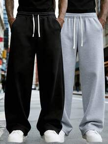 This Men's Casual Sweatpants Feature A Loose, Straight-Leg Silhouette With A Thermal Lined For Comfort And Drape. Suitable For Both Indoor And Outdoor Wear, It Also Makes A Great Gift For Couples. The Pants Are Made Of 100% Polyester Fabric And Have A Drawstring Waistband For Adjustable Fit, Available In Multiple Colors. - Black - View 10