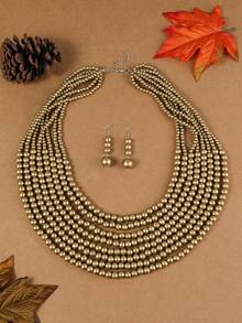 Bộ trang sức gồm 1 bộ hạt gỗ nhiều lớp thủ công, kiểu dáng boho, thích hợp cho nữ, đi biển, dự tiệc, dạ hội Trung Đông, gồm vòng cổ, bông tai và vòng tay nhiều màu sắc. - vàng - Xem 3