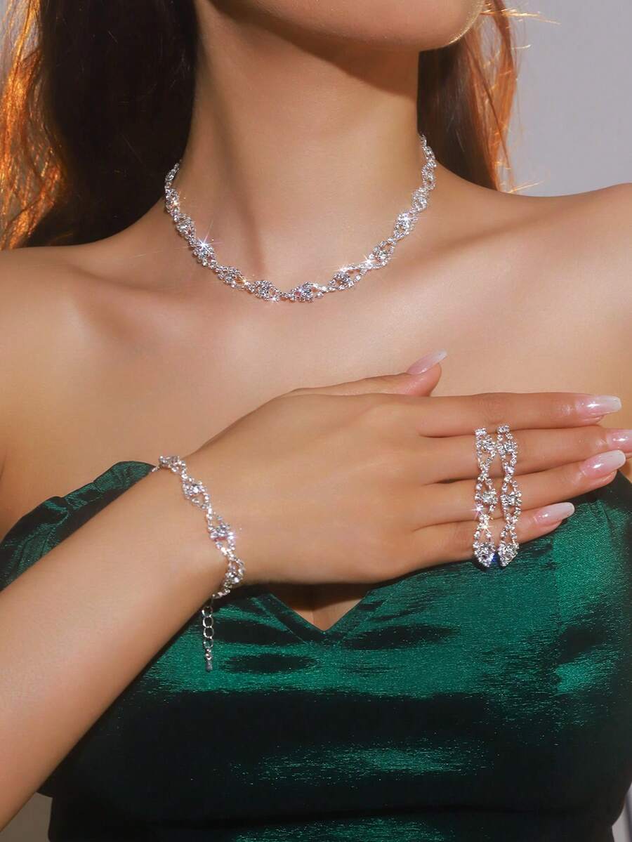 Bộ 4 món thời trang thanh lịch màu trắng gồm bông tai, dây chuyền và vòng tay, kiểu dáng sang trọng nhẹ nhàng, thích hợp làm quà tặng Ngày Valentine, phù hợp cho các bữa tiệc, tiệc tối, trang phục hàng ngày cho nữ giới và đám cưới. - Bạc - Xem 1
