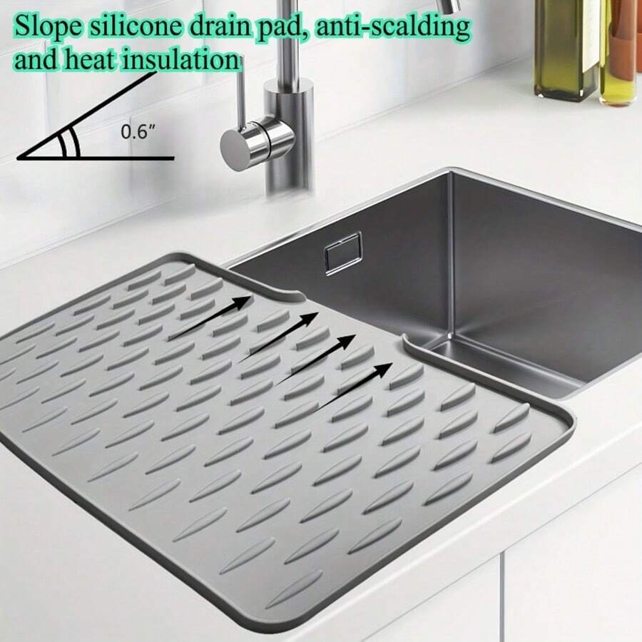 1 tấm lót thoát nước silicon chống trượt, bề mặt chịu nhiệt, hệ thống thoát nước tích hợp - Đa năng - Thích hợp cho mặt bàn, bồn rửa và tủ lạnh - Dễ dàng vệ sinh, bền chắc.