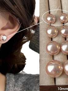 一对时尚优雅的粉色仿珍珠耳环，适合女性日常佩戴，也适合在晚宴/派对等场合佩戴，可作为生日礼物送给朋友，或作为情人节礼物。 - 粉色 - 查看 2