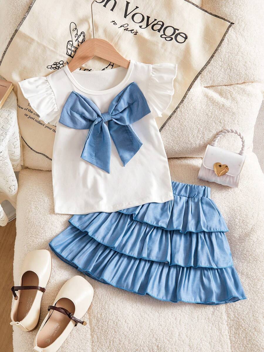 Conjunto de vestido de pastel con lazo dulce para niñas pequeñas - Camiseta blanca con mangas con volantes + Falda plisada azul de varias capas con decoración de lazo grande + Cintura elástica, Estilo princesa Conjunto de 2 piezas para verano, Adecuado para fiesta de cumpleaños, salir con amigos, uso diario, primavera/verano - Azul - Ver 1