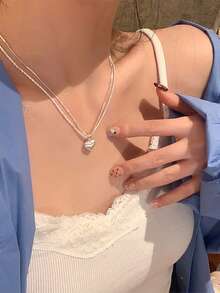 1件简约哑光心形吊坠项链，925纯银轻盈奢华颈链，精致珠宝礼品，适合女孩日常及约会佩戴 - 款式2 - 查看 4