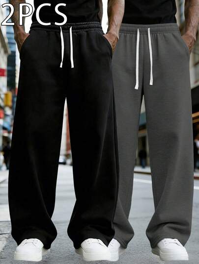 两件套轻薄长裤，适合春夏穿着，采用100%涤纶面料，宽松舒适，透气性佳。男士休闲运动裤两件套，宽松直筒裤型，垂坠感好，适合室内外活动，也可作为情侣礼物。采用100%涤纶面料，配有抽绳腰带，方便调节松紧，多种颜色可选。夏季轻薄两件套。