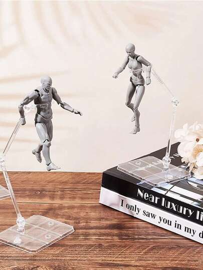 1/8 Scale Modern Fashion Transparent Doll Stand With Adjustable Waist Clip, Providing Stable Support For Posable Dolls. This Efficient Display Stand Features An Invisible Transparent Design, Adjustable Waist Clip, And Is Made Of Durable Acrylic Material. It Is An Essential Tool For Doll Collectors, Suitable For Photography, Display, And Decoration.