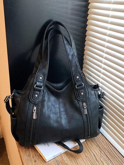 1个纯色PU布手提袋，金属拉链装饰，多口袋大容量，拉链封口，休闲百搭，适合通勤、购物、短途旅行