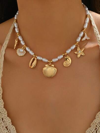 1 chiếc vòng cổ mặt dây chuyền hình sinh vật biển, vòng cổ đính hạt ngọc trai giả CCB không đều, sáng tạo, thủ công dành cho nữ, thích hợp để đeo hàng ngày, dự tiệc bãi biển, lễ hội âm nhạc, du lịch và chụp ảnh.