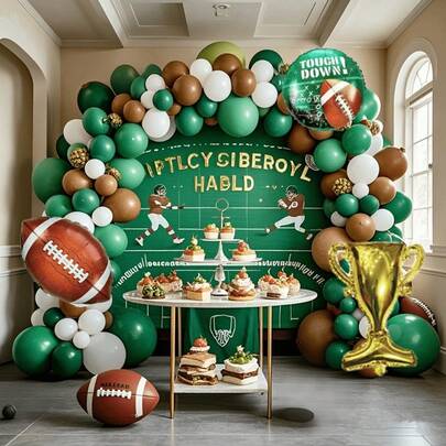 这款运动主题气球拱门由10英寸和5英寸的绿色、棕色和白色乳胶气球，以及橄榄球和金色奖杯铝箔气球组成，是橄榄球主题生日派对装饰的完美之选。