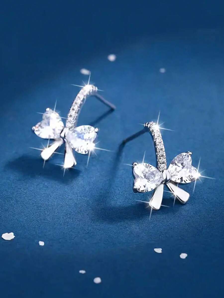 1 par de pendientes elegantes de lazo de plata de ley 925, incrustados con circonita cúbica sintética brillante, adecuados para novias, decoración de fiestas, joyería exquisita, también un excelente regalo de cumpleaños para mujeres y hombres