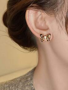 1 par de pendientes de botón con lazo de strass delicados - color café - Ver 3