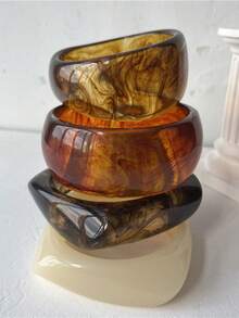 Vòng tay nhựa hình cây hình học bản rộng kiểu cổ điển, vòng tay bản to không đối xứng màu nâu trong suốt. - vòng đeo tay - Xem 1