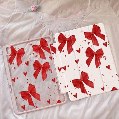 一款可爱的卡通红色蝴蝶结爱心图案双面亚克力透明水晶后盖，防震，适用于iPad 7、8、10代（10.2英寸），内置笔槽，支持睡眠/唤醒功能，是理想的圣诞节和新年礼物。