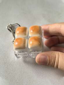 1 قطعة سلسلة مفاتيح بشكل رغيف كراميل، لعبة تخفيف التوتر، اختبار مفتاح لوحة المفاتيح الميكانيكية، حلقة مفاتيح، ديكور المكتب، تميمة الهاتف، لعبة إبداعية مضادة للقلق للأصابع - أصفر - مشاهدة 2