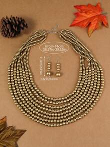 Bộ trang sức gồm 1 bộ hạt gỗ nhiều lớp thủ công, kiểu dáng boho, thích hợp cho nữ, đi biển, dự tiệc, dạ hội Trung Đông, gồm vòng cổ, bông tai và vòng tay nhiều màu sắc. - vàng - Xem 2