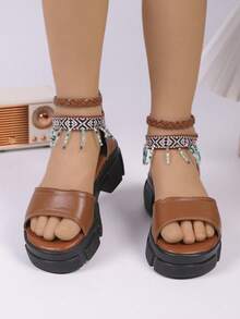 1 đôi sandal cao gót thời trang bằng da PU cho bé gái, kiểu dáng trơn màu, có tua rua, phù hợp với phong cách đường phố sành điệu của các bé gái, sandal cao gót thời trang. - màu nâu - Xem 2