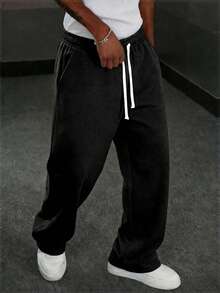 This Men's Casual Sweatpants Feature A Loose, Straight-Leg Silhouette With A Thermal Lined For Comfort And Drape. Suitable For Both Indoor And Outdoor Wear, It Also Makes A Great Gift For Couples. The Pants Are Made Of 100% Polyester Fabric And Have A Drawstring Waistband For Adjustable Fit, Available In Multiple Colors. - Black - View 2