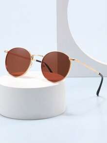 Gold-framed Brown Lens