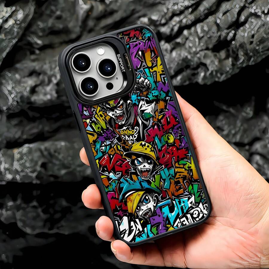 Esta elegante funda con diseño de grafiti y calavera es compatible con los modelos 17, 16, 15, 14 Pro Max, 13, 12, 11, XR y XS Plus. Fabricada en silicona TPU, ofrece protección contra golpes y caídas, además de una sensación superior. Es un regalo ideal para familiares, amigos y seres queridos, y una opción perfecta para San Valentín.fundas para ,fundas,accesorios para celular,fundas para celular,fundas para 13,funda 13,funda 16,funda 17 pro max,funda 15,fundas para 16,fundas 11,fundas ,Soporte magnético - Negro - Ver 1
