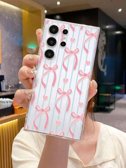 1 pieza Funda de teléfono transparente con estampado de corazón y lazo a la moda, a prueba de caídas, compatible con Samsung Galaxy A07/A17/S26/S26 Plus/S26 Ultra, S25/S25 Plus/S25 Ultra, A16/A36/A26/A56/A50/A12/A32/A52/A72/A51/A21S/A13/A14, S24/S24 Plus/S24 Ultra, S20/S23/S22, A53, S20 FE, S21, compatible con Xiaomi 11/12 Pro/12/12X/13 Pro/14 Pro/15 Pro/X3 Pro, compatible con Redmi 10/9/Note 9/12C/Note 11 Pro/Note 8 Pro/9C/9A