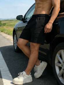 Quần short nam màu trơn, cạp chun, dáng rộng, nhẹ, có túi, thích hợp mặc mùa hè. - màu đen - Xem 1