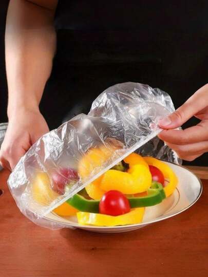 100片/300片/500片装一次性彩色可重复使用PE保鲜膜，适用于碗碟、剩菜等。