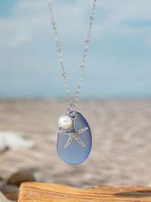 一款波西米亚风格的沙滩玻璃海豚和星星项链，适合女士在度假和音乐节期间佩戴。 - 彩色 - 查看 15