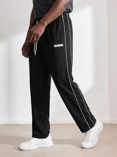 Driftmere 男士休闲运动长裤，宽松直筒版型，垂坠感好。适合室内外活动，也可作为情侣礼物。面料为100%涤纶。配有抽绳腰带，方便调节松紧，多种颜色可选。适合春夏穿着。