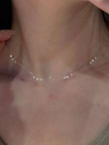 1件S925纯银水滴形锆石吊坠项链，几何Y形锁骨链配长流苏，简约优雅，适合女性日常佩戴，也可作为礼物赠送。 - 金色 - 查看 2