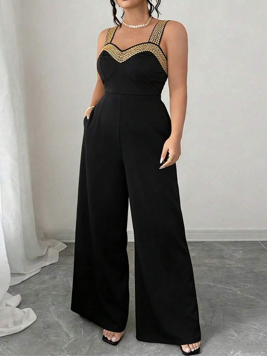 Bộ jumpsuit thanh lịch cỡ lớn với dây đeo mảnh, viền đính hạt vàng trên dây đeo và phần ngực, có túi, kiểu quần ống rộng, phù hợp cho các bữa tiệc và sự kiện trang trọng, màu đen mùa hè. - màu đen - Xem 1