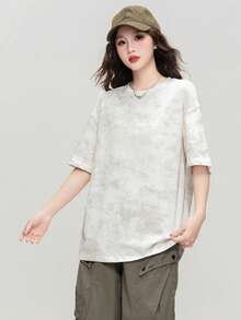 Camiseta holgada de cuello redondo blanca con estampado floral irregular de JUTU para primavera/verano, nueva blusa casual de manga corta versátil y de largo medio para mujeres - 0A11 Blanco roto - Ver 2