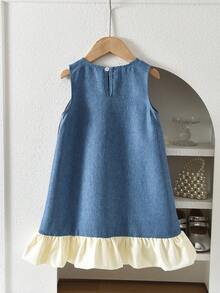 Đầm không tay kiểu denim cho bé gái, kiểu dáng thời trang dễ thương với nơ và vạt áo phối hợp, cổ tròn, phù hợp cho bé từ 3-7 tuổi. - Màu xanh lam - Xem 2