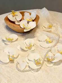 5/15 bông hoa lan Phalaenopsis trắng nhân tạo sống động như thật, kết cấu chân thực, phù hợp cho nhiều mục đích trang trí DIY. Ứng dụng cho bó hoa DIY, cắm hoa, trang trí nhà cửa, trang trí tiệc, phụ kiện cưới, trang trí bàn, tường hoa, trang trí phòng ngủ và phòng khách. Lý tưởng cho Ngày của Mẹ, Ngày của Cha, Lễ tốt nghiệp, Sinh nhật, Đám cưới và các dịp khác. - Nhiều màu - Xem 11
