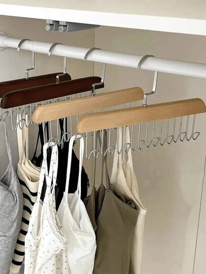 This Multi-Functional Wooden Hanger (3/1) Is An Ideal Choice For Closet Storage. It Is Equipped With Eight 360-Degree Rotating Hooks And A Space-Saving Bra Hook, Which Can Neatly Store Shirts, Underwear, Bras, Aprons, Hats, Ties, Shoulder Straps, Vests, Etc. It Leaves No Marks When Drying Clothes And Is An Ideal Choice For Storing School Supplies. Its Simple And Fashionable Design Can Be Perfectly Integrated With Any Interior Style.