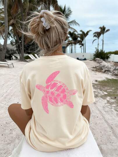 女士夏季新款简约可爱海龟印花休闲度假风宽松圆领杏色短袖T恤，时尚日常上衣，适合日常度假穿着，白色上衣