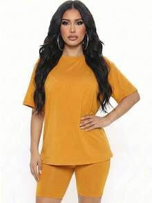 Conjunto de 2 piezas de top holgado y pantalones cortos de motociclista para mujer, cuello redondo, color liso, lavable a máquina, cómodo y básico para estar en casa en verano, primavera y otoño. - Crema de tomate - Ver 1