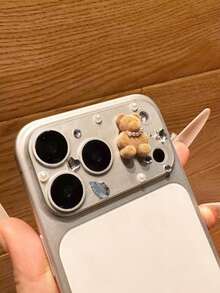 Protector de lente de cámara transparente con base de cristal y diseño de oso lindo en 3D, compatible con iPhone 17 Pro Max/17 Pro, capa protectora clara y duradera, cubierta de lente de cámara aplicable para uso diario, oficina y hogar, a prueba de agua, a prueba de golpes, resistente a arañazos - Oso marrón claro perlado - Ver 3