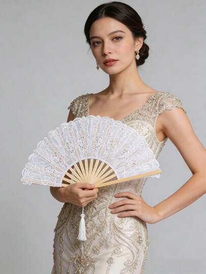 1把蕾丝折扇，采用优质蕾丝手工制作，精致奢华。它不仅是一件实用的扇子，更是一件时尚配饰，为您的生活增添无限优雅与浪漫。适合日常出行、参加派对、正式场合、生日礼物和派对装饰。也适合作为妇女节礼物、旅行必备、婚礼回礼、Y2K风格、卧室装饰、女性汽车配件、厨房装饰、海滩、夏季、度假、假日、旅行必备、外出上衣和家居用品。