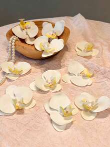 5/15 bông hoa lan Phalaenopsis trắng nhân tạo sống động như thật, kết cấu chân thực, phù hợp cho nhiều mục đích trang trí DIY. Ứng dụng cho bó hoa DIY, cắm hoa, trang trí nhà cửa, trang trí tiệc, phụ kiện cưới, trang trí bàn, tường hoa, trang trí phòng ngủ và phòng khách. Lý tưởng cho Ngày của Mẹ, Ngày của Cha, Lễ tốt nghiệp, Sinh nhật, Đám cưới và các dịp khác. - Nhiều màu - Xem 10