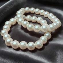 Dos pulseras beige de 10 mm