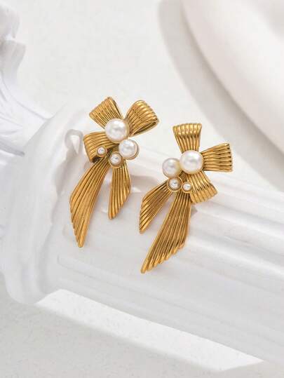 一对优雅的丝带蝴蝶结仿珍珠耳环，适合婚礼、派对、日常佩戴。