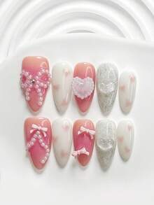 Bộ 10 món móng tay acrylic mềm mại và ngọt ngào, bao gồm miếng dán móng acrylic, nơ hồng, hình trái tim trắng lấp lánh, trái tim hồng vẽ tay, sơn móng tay trắng, cùng dụng cụ làm móng (1 miếng dán gel + 1 dũa móng). Có 3 kích cỡ: vuông, hạnh nhân và vuông ngắn. Thích hợp cho phụ nữ đi làm, du lịch, dự tiệc, làm móng hàng ngày, một món quà tuyệt vời cho phái nữ và các cô gái. Móng tay giả thủ công. - Nhiều màu - Xem 16