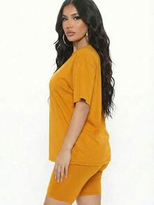 Conjunto de 2 piezas de top holgado y pantalones cortos de motociclista para mujer, cuello redondo, color liso, lavable a máquina, cómodo y básico para estar en casa en verano, primavera y otoño. - Crema de tomate - Ver 2