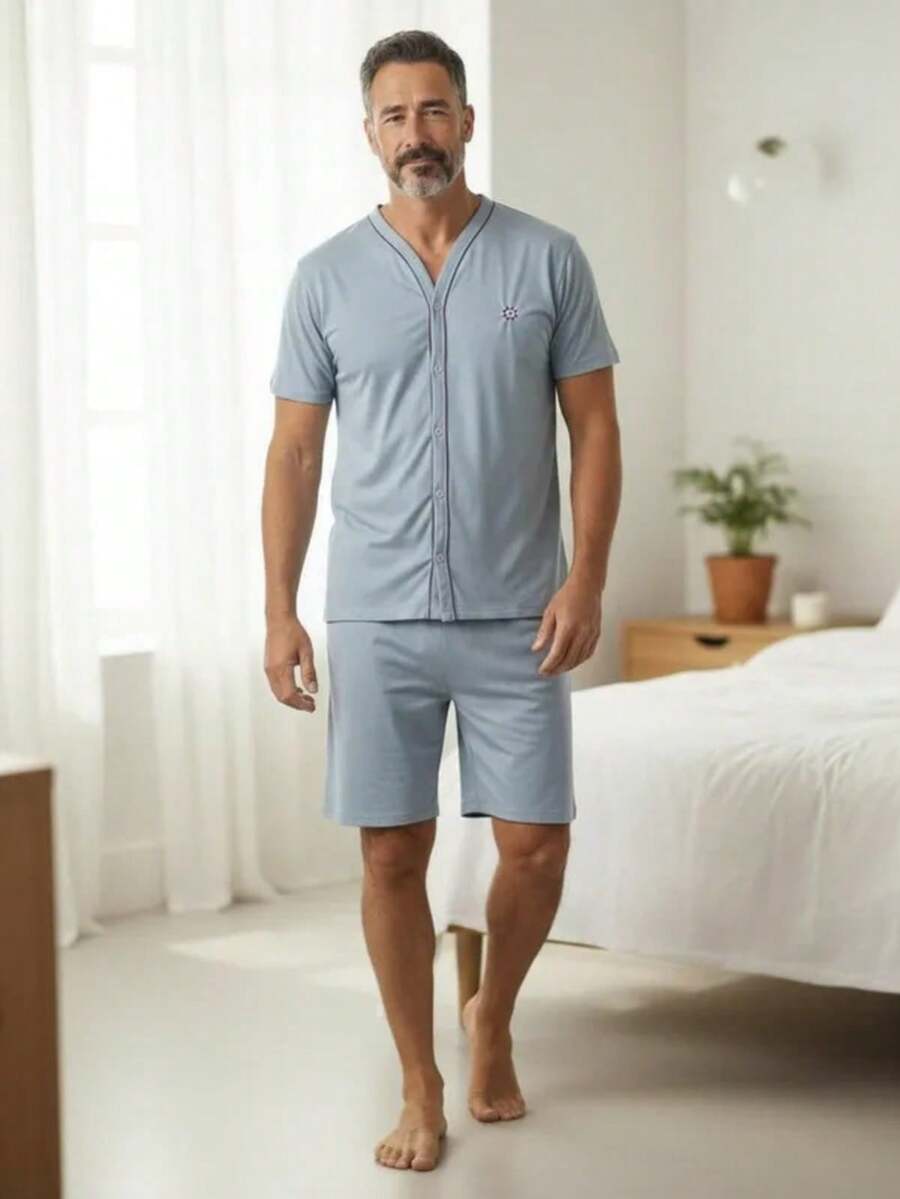 Conjunto de pijama masculino de manga curta com lapela, fechamento frontal com botões e elasticidade média. - Cinza - Visão 1