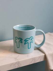 清爽夏日风情蓝色陶瓷马克杯——俏皮的椰树涂鸦设计，内壁印有“夏日清凉”字样，是冰咖啡、冷萃咖啡和海滩主题饮品的理想之选，为您的日常补水增添趣味和活力。 - 彩色 - 查看 2