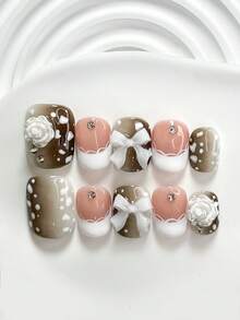 10件套优雅公主风波点美甲套装，包含3D白色玫瑰、白色蝴蝶结美甲装饰、手绘白色豹纹、裸棕色底油、白色蕾丝花边、白色指甲油，精致优雅的手工按压式美甲贴片。 - 彩色 - 查看 2