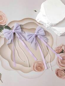 Bộ 2 kẹp tóc nơ tua rua đính ngọc trai, phụ kiện tóc thanh lịch và dễ thương dành cho bé gái. - Màu tím hoa cà - Xem 2